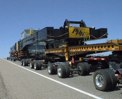 Transformer trailer crossing i10 on 411 ave bridge.