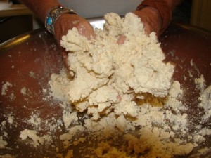 ajo mixing
                  dough. Photo by Ruel.