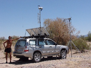 Tim and his Suburu at Mile99
