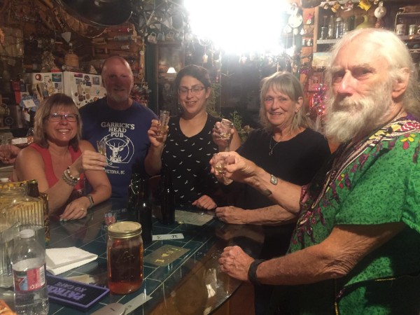 Tasting Megan's Mead at Nita's in Pie Town. Photo
              by Nita.